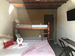 Pousada Bougainville Suites