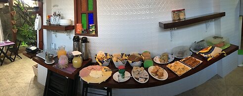 Pousada Bougainville Suites