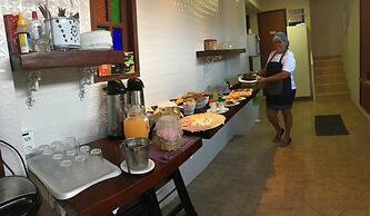 Pousada Bougainville Suites