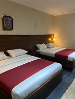 Posh Hotel And Suites