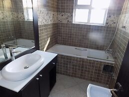 Posh Hotel And Suites