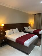 Posh Hotel And Suites