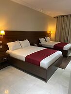 Posh Hotel And Suites
