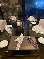 Posh Hotel And Suites
