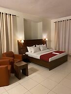 Posh Hotel And Suites