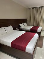 Posh Hotel And Suites
