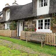 a Fairytale Thatched Highland Cottage