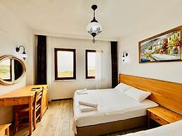 Sukha Inn Otel & Beach