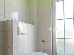 Holiday Flat in Bastorf With its own Garden