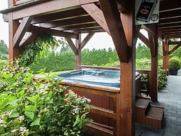 Affluent Chalet in Septon with Whirlpool, Sauna, Hot Tub