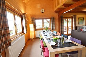 Affluent Chalet in Septon with Whirlpool, Sauna, Hot Tub