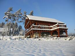 Affluent Chalet in Septon with Whirlpool, Sauna, Hot Tub