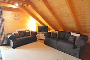 Affluent Chalet in Septon with Whirlpool, Sauna, Hot Tub