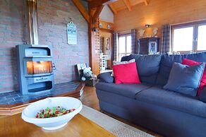 Affluent Chalet in Septon with Whirlpool, Sauna, Hot Tub