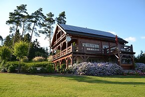 Affluent Chalet in Septon with Whirlpool, Sauna, Hot Tub