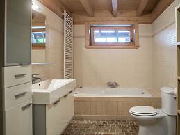 Affluent Chalet in Septon with Whirlpool, Sauna, Hot Tub