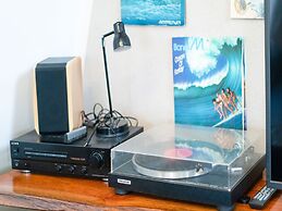 Home With Vinyls, Bikes and Waterways