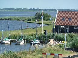 Modern Holiday Home in Friesland by the Lake