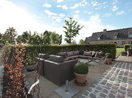 Pleasant Holiday Home in West Flanders with Enclosed Garden & Hot Tub