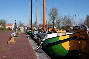 Charming Apartment in Langweer With Jetty