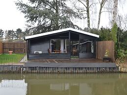 Modern Chalet in a Small Park With a Fishing Pond