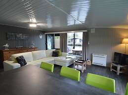 Modern Chalet in a Small Park With a Fishing Pond