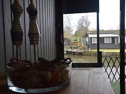 Modern Chalet in a Small Park With a Fishing Pond