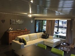 Modern Chalet in a Small Park With a Fishing Pond