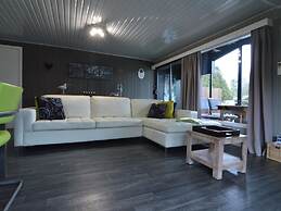 Modern Chalet in a Small Park With a Fishing Pond