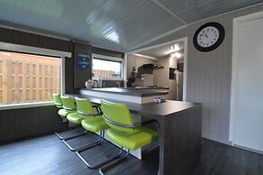 Modern Chalet in a Small Park With a Fishing Pond