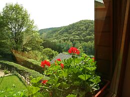 Cottage With a Terrace and a View of the Valley