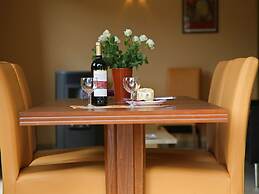 Cottage With a Terrace and a View of the Valley