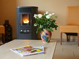 Cottage With a Terrace and a View of the Valley