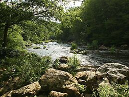Cottage With a Terrace and a View of the Valley