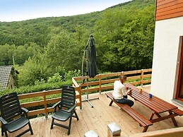 Cottage With a Terrace and a View of the Valley