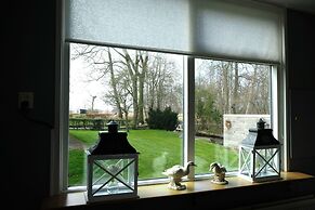 Cozy House with a Boat near Giethoorn & Weerribben Wieden National Par