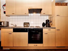 Pleasing Holiday Home in Richelle With Garden, Terrace, BBQ