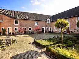 Pleasing Holiday Home in Richelle With Garden, Terrace, BBQ