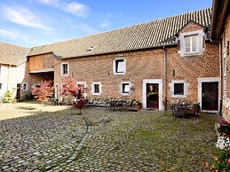 Pleasing Holiday Home in Richelle With Garden, Terrace, BBQ