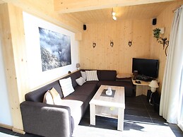 Lavish Wooded Chalet with Sauna & Hot Tub in Hohentauern