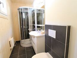 Lavish Wooded Chalet with Sauna & Hot Tub in Hohentauern