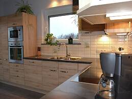 A Villa Between the Town Centre and the Forest