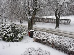 A Villa Between the Town Centre and the Forest