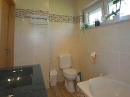 A Villa Between the Town Centre and the Forest