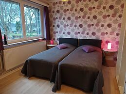 A Villa Between the Town Centre and the Forest