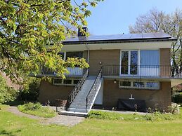 A Villa Between the Town Centre and the Forest