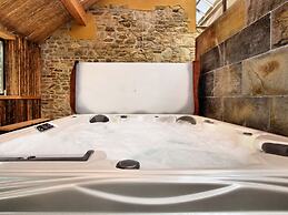 Pleasant Holiday Home in Erezée Ardennes with Hot Tub, Sauna