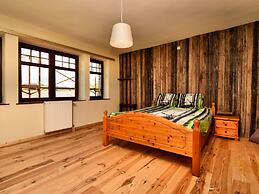 Pleasant Holiday Home in Erezée Ardennes with Hot Tub, Sauna