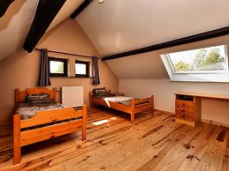 Pleasant Holiday Home in Erezée Ardennes with Hot Tub, Sauna
