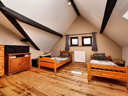 Pleasant Holiday Home in Erezée Ardennes with Hot Tub, Sauna